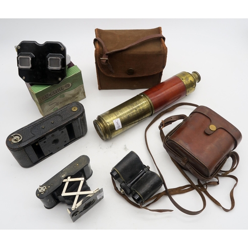 547 - A mixed lot, consisting of a brass three-draw telescope, a leather-cased 1902-dated pair of binocula... 