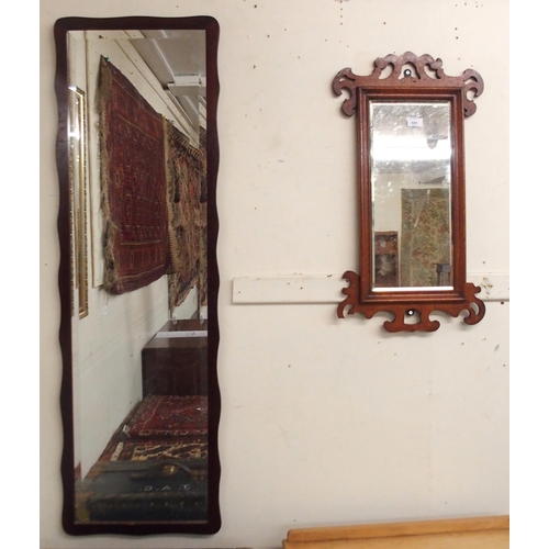 101 - A 20th century gilt framed bevelled glass wall mirror, a mahogany framed bevelled glass wall mirror ... 