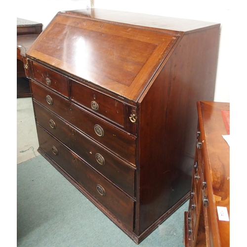 106 - A Victorian mahogany writing bureau with fitted fall front writing compartment over two over three d... 