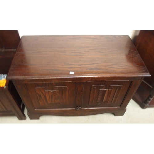 110 - A 20th century linen fold tv media unit and a linen fold blanket chest (2)