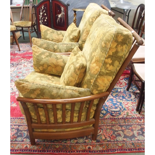 161 - A pair of contemporary Ercol elm and beech framed armchairs (2)