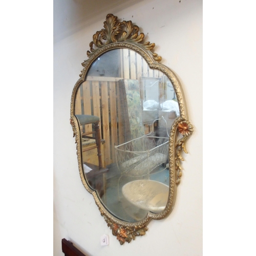 178 - A 20th century gilt metal framed rococo style wall mirror