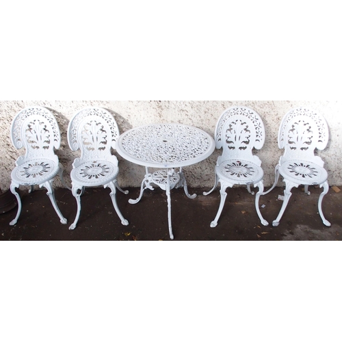 181 - A 20th century cast metal garden table and four accompanying chairs (5)