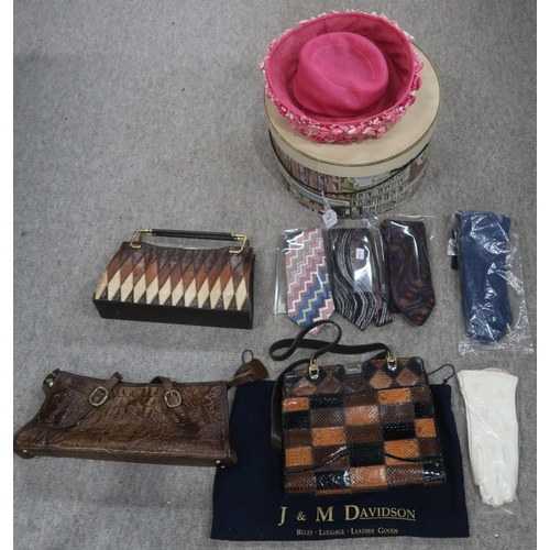 219 - A Copland and Lye hat box, three Missoni ties, a J & M Davidson leather bag and three snake skin... 