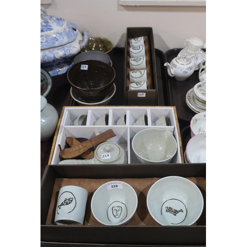 228 - A selection of Korean pottery bowls, together with a saki set etc