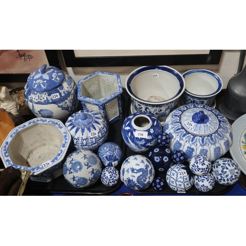 236 - A collection of blue and white pottery including Chinese pumpkin shaped jars and covers, ginger jar,... 