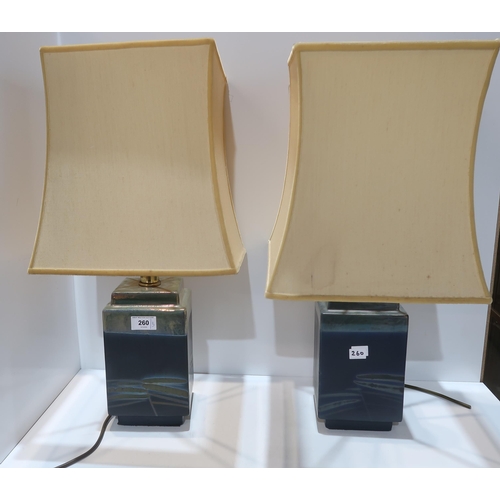 260 - A pair of Margery Clinton table lamps and another lamp by the same hand