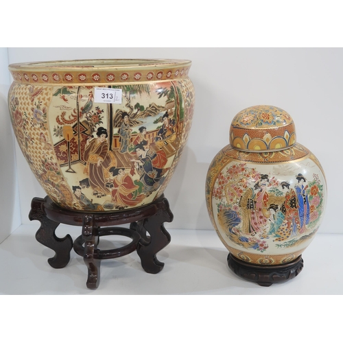 313 - A Chinese fish bowl and stand and a ginger jar