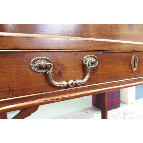 33 - A Georgian mahogany single drawer fall front writing bureau on square chamfered supports