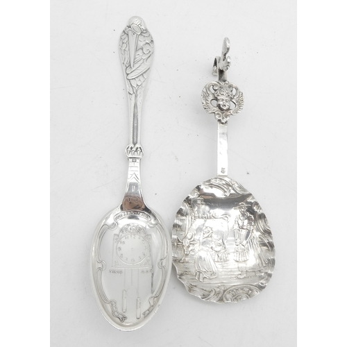 332 - A collection of silver spoons including a silver serving spoon, the bowl lobed, by Walker & Hall... 