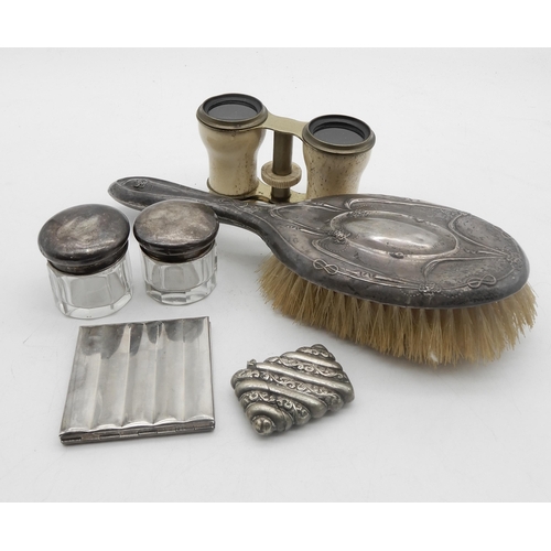 335 - A silver mounted brush, with moulded decoration of ribbon swags, by Jones & Crompton, Birmingham... 