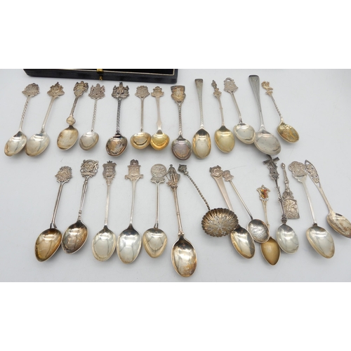 348 - A collection of silver flatware including silver souvenir spoons, most with UK hallmarks, some white... 