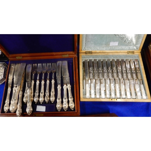 359C - A cased set of EPNS and mother of pearl handled fish knives and forks, with engraved floral decorati... 