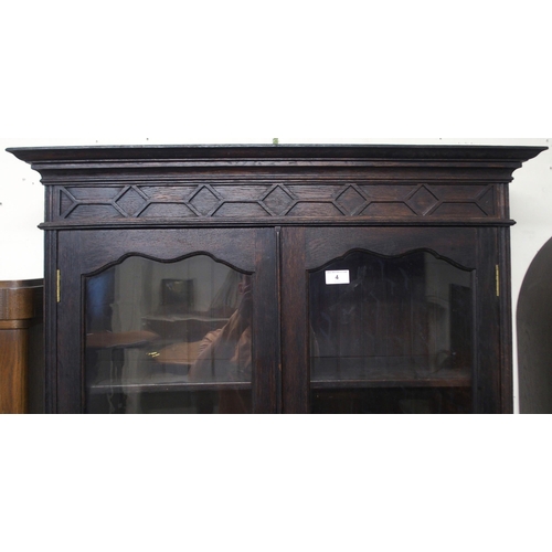 4 - A 20th century stained oak bureau bookcase with glazed two door bookcase top over fall front writing... 