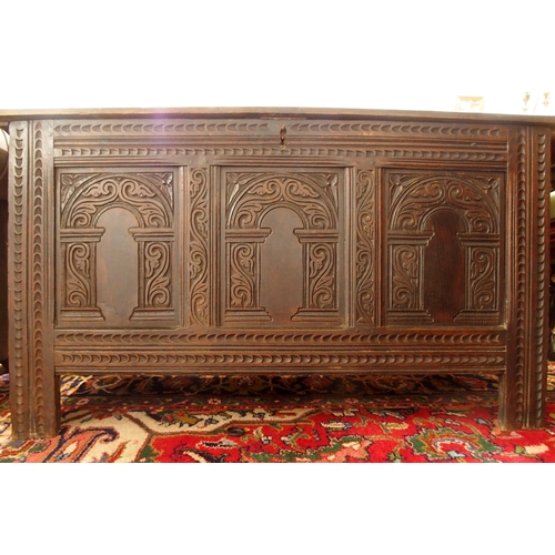 63 - A 19th century stained oak blanket chest with carved panels to front and a mahogany circular topped ... 