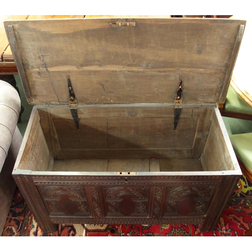 63 - A 19th century stained oak blanket chest with carved panels to front and a mahogany circular topped ... 