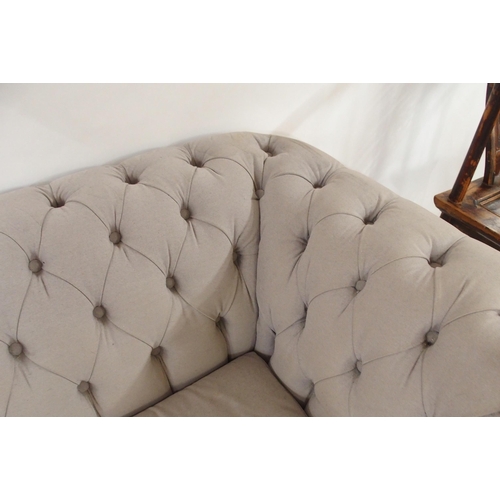 65 - A 20th century Debenhams fabric button back upholstered Chesterfield style club sofa