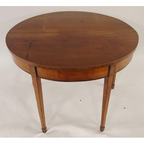 66 - A Victorian mahogany demi lune fold over tea table with single drawer on square tapering supports