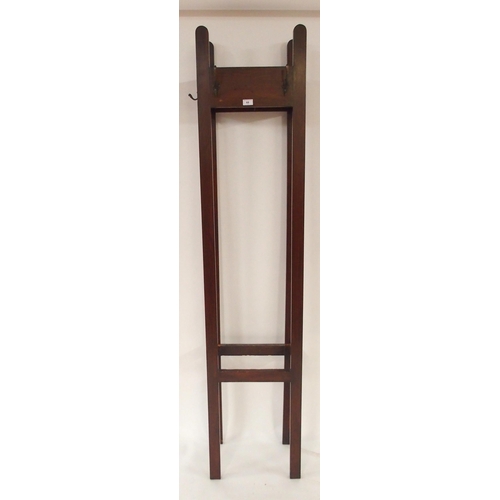 68 - A 20th century stained pine hat and coat stand