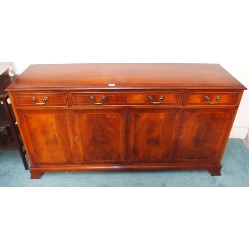 73 - A 20th century mahogany four door sideboard