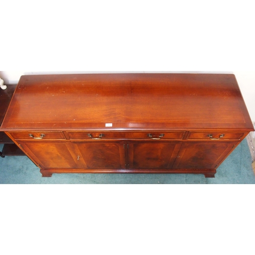 73 - A 20th century mahogany four door sideboard