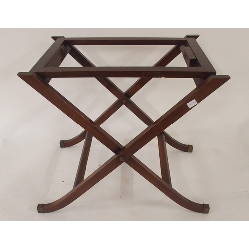 77 - A 20th century mahogany butler tray and stand with drop sides