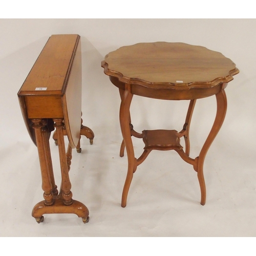 78 - A Victorian mahogany drop leaf table with stretchered turned supports and a mahogany two tier window... 