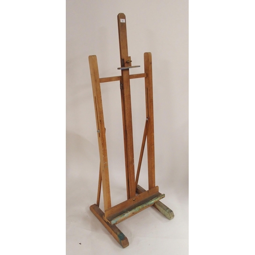 84 - A 20th century beech folding adjustable artists easel