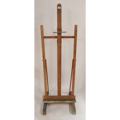 84 - A 20th century beech folding adjustable artists easel