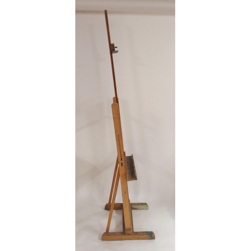 84 - A 20th century beech folding adjustable artists easel