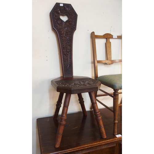 85 - An early 20th century elm spinning chair carved to seat and splat with thistles, a Victorian mahogan... 