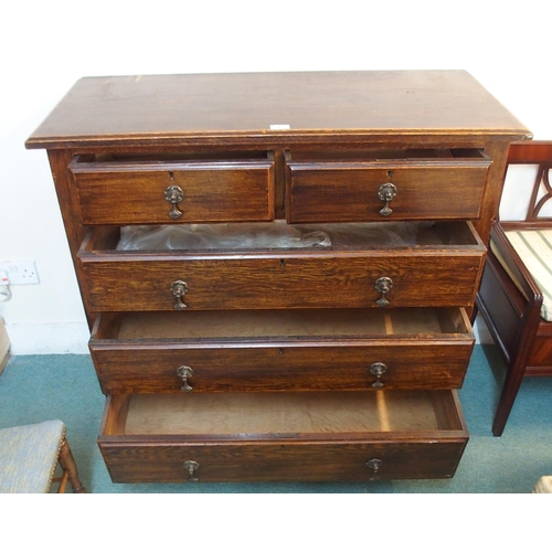 86 - A 20th century oak two over three chest of drawers