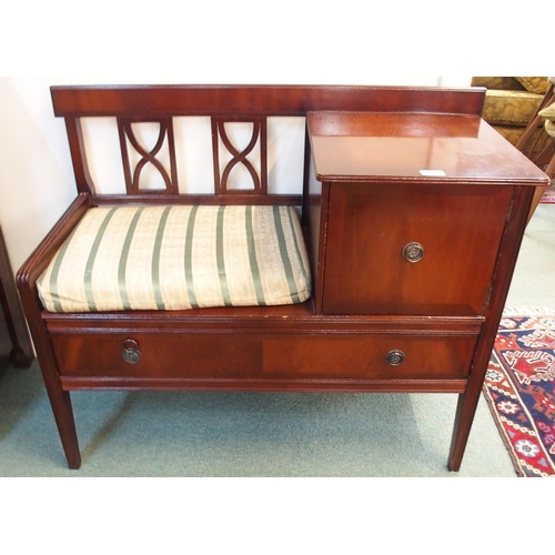 87 - A 20th century mahogany telephone table/seat