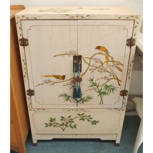 99 - A 20th century Oriental style two door drinks cabinet