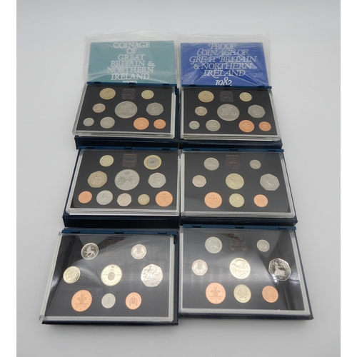 372 - ROYAL MINT proof coin sets with examples through the 1990's together with 1979 and 1982