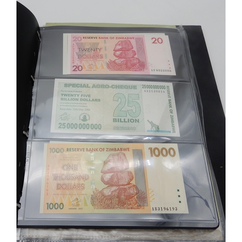 377 - A lot comprising Zimbabwe bank notes featuring a Fifty Trillion Dollars example