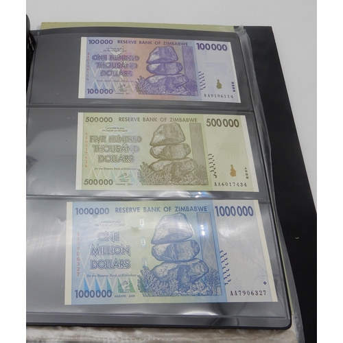 377 - A lot comprising Zimbabwe bank notes featuring a Fifty Trillion Dollars example