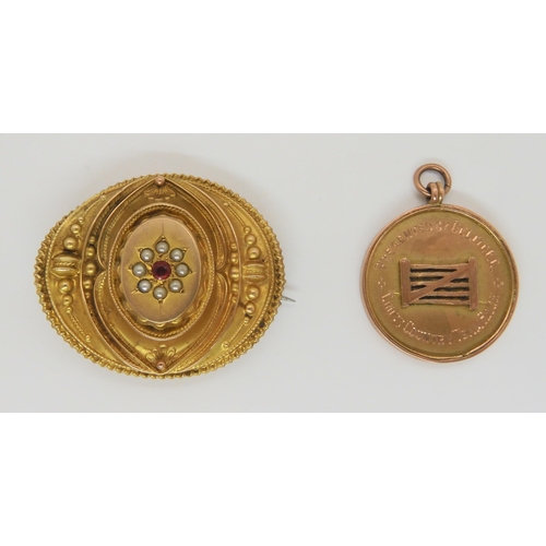 510 - A 9ct gold Cross country medal, together with a yellow metal pearl and red gem set brooch and a ribb... 