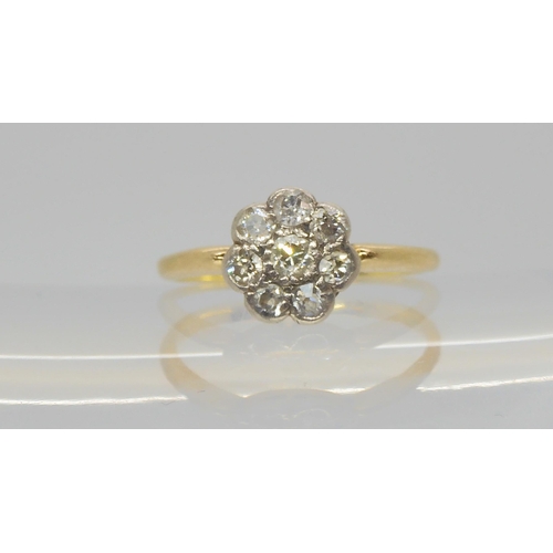 A bright yellow metal old cut diamond flower ring, set with estimate approx 0.30cts of diamonds, size L1/2, weight 2.2gms