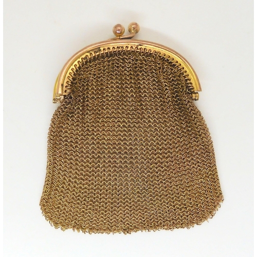 574 - A yellow metal mesh purse with a continental 9k hallmark, weight 24.8gms