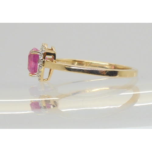 576 - A 9ct gold trilliant cut pink sapphire and white zircon ring, size Q, weight 2.6gms