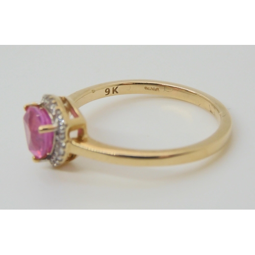 576 - A 9ct gold trilliant cut pink sapphire and white zircon ring, size Q, weight 2.6gms