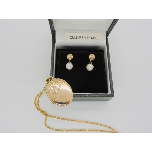 577 - A 9ct back and front locket, 9ct chain and a pair of 9ct gold pearl earrings, weight 5.9gms