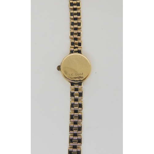 584 - A 9ct gold ladies Rotary watch, weight including mechanism 13.5gms