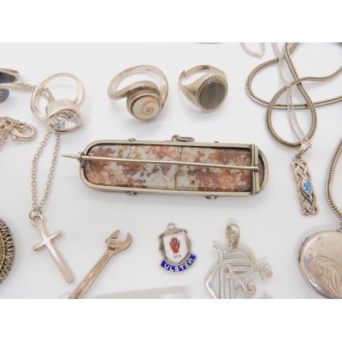 613 - A white metal mounted Scottish Agate mosaic brooch silver pendants, rings and other items