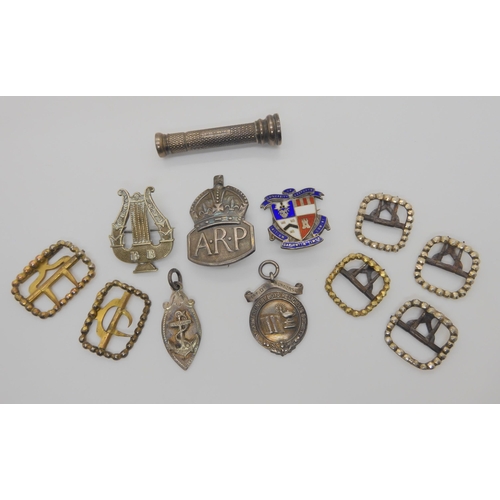 615 - Four silver gilt buckles hallmarked 1868, a Sampson Mordan vesta with a monogrammed seal finial, sil... 