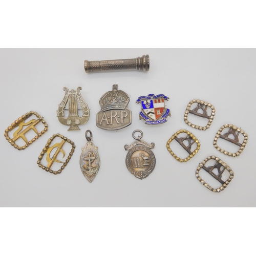 615 - Four silver gilt buckles hallmarked 1868, a Sampson Mordan vesta with a monogrammed seal finial, sil... 