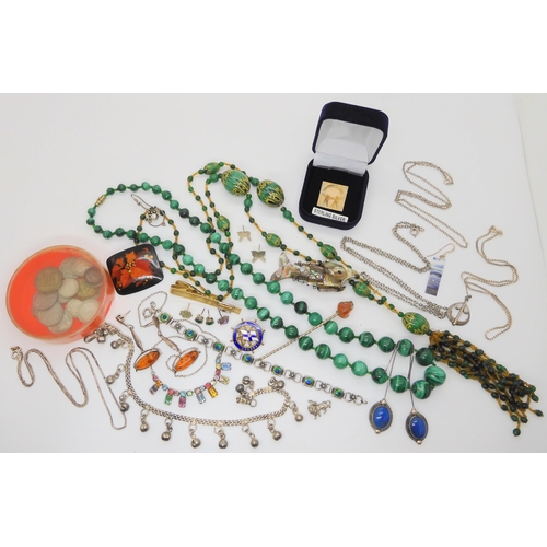 620 - A collection of costume jewellery and silver to include a continental silver and enamel bracelet, a ... 