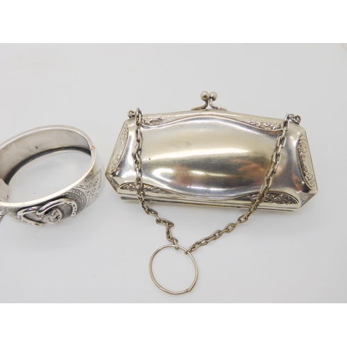 632 - A silver Lucky Fox bangle, hallmarked 1882, together with three white metal and silver charms and an... 