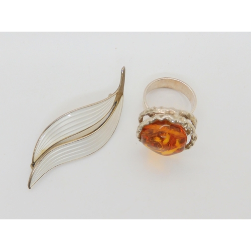 637 - A silver and enamel Aksel Holmsen leaf brooch and a Danish retro silver and amber ring in original b... 